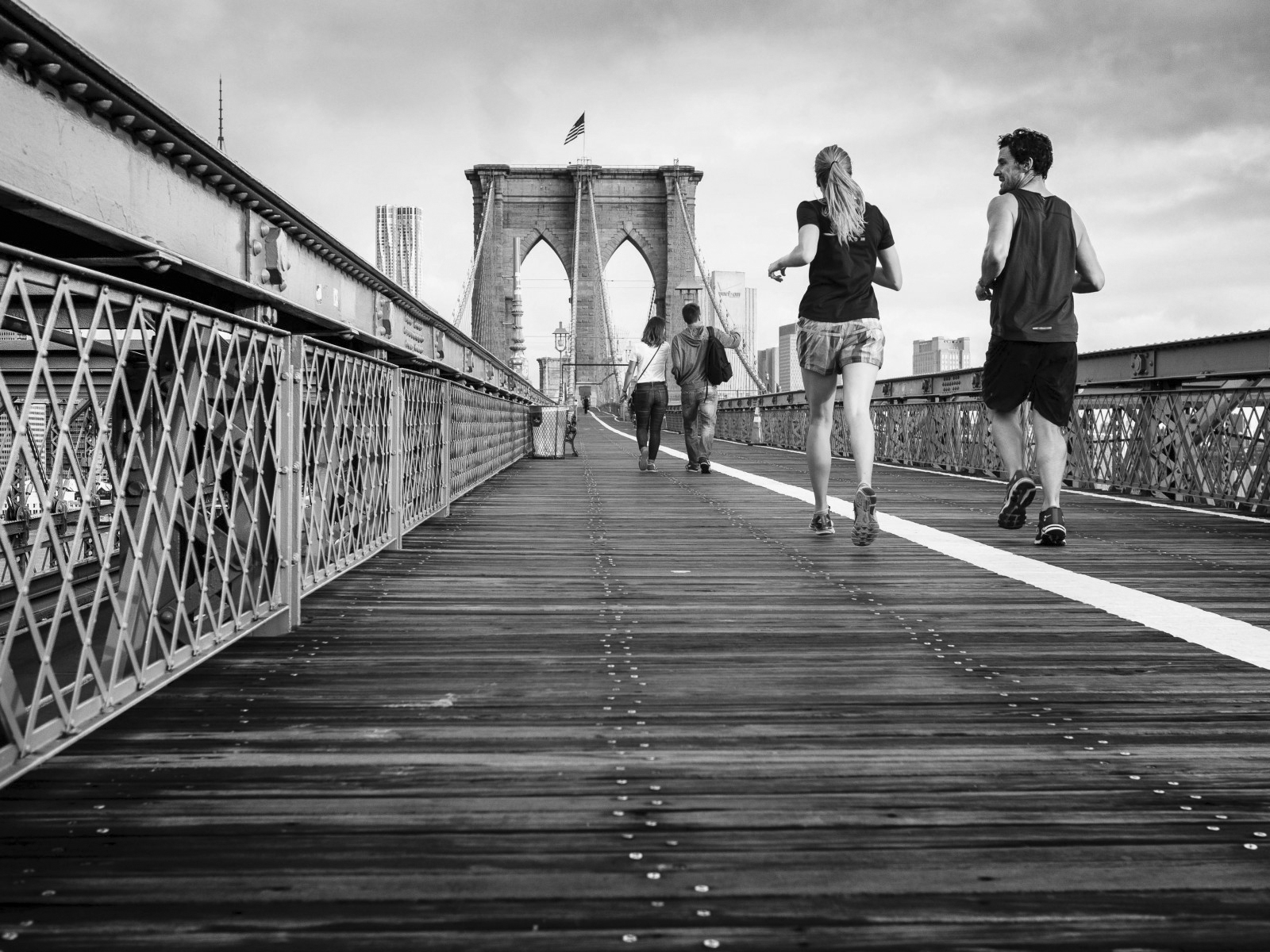 joggers-on-bridge
